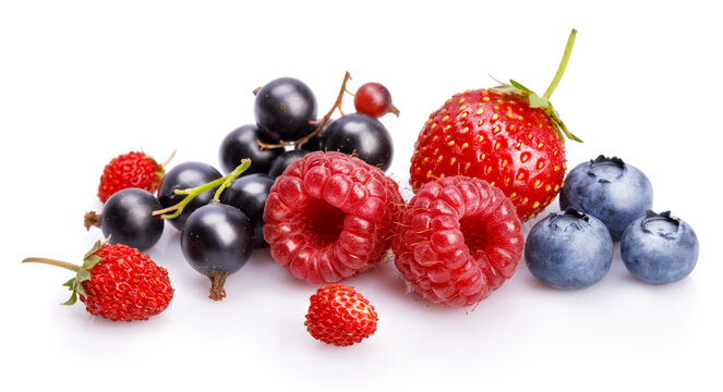 Set fresh berry. Mix summery fruit raspberry strawberry currant blueberry and wild strawberry with green leaf still life, isolated on white background.