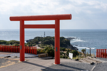 Naklejka premium Red Torii gate at Ryugu Shrine Nagasaki-bana Cape
