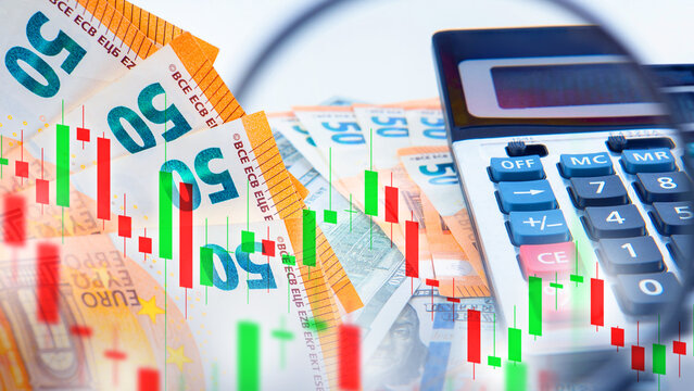 Currency trading. Euro banknotes and calculator with candlestick chart illustrate financial analysis, exchange rates and forex market planning