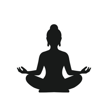 Meditator sits in a classic lotus position demonstrating balance and deep inner spiritual peace.