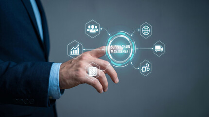 Obraz premium Professional businessman touching a digital supply chain management interface with glowing icons on gray background