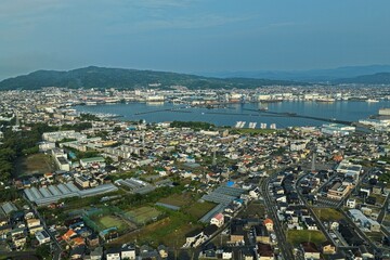 Fototapeta premium Aerial drone photo of Miho no Matsubara coastline and port town, Shizuoka, Japan
