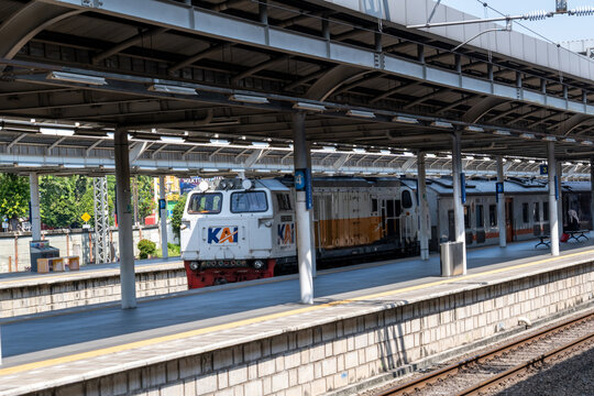 Jakarta, Indonesia - May 28, 2026: A KAI long-distance passenger train led by a CC206 diesel-electric locomotive passing through Jatinegara Station.