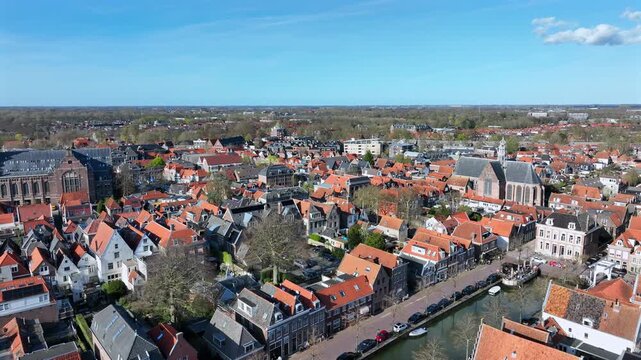 Aerial overview of a historic harbor city on the IJsselmeer in Europe