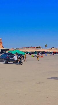 Panoramic Day View Of Jemaa El Fnaa Square And Koutoubia Mosque In Marrakech Morocco