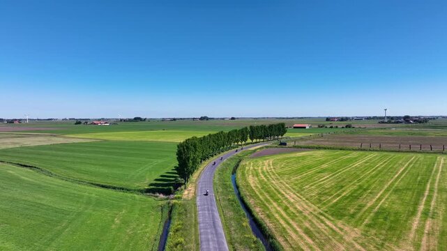 Motorcycle tour through rural landscape in Europe