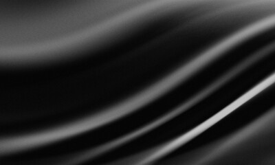 abstract black background. Folds of dark, luxurious fabric silk, satin, or velvet illuminated by dim light in a dark room © maskam