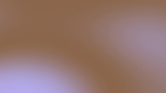 Dreamy blurred abstract background featuring warm brown tones and a subtle purple glow suitable for design projects