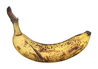 Ripe yellow banana peel showing brown spots, transparent background © Harry