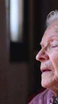 Elderly woman feeling sad and crying tears 