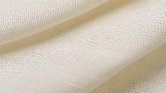 Natural cotton with linen fabric folds, white homespun vintage fabric, natural eco folded linen background. Bio textile material backdrop, canvas top view, close up, rotating