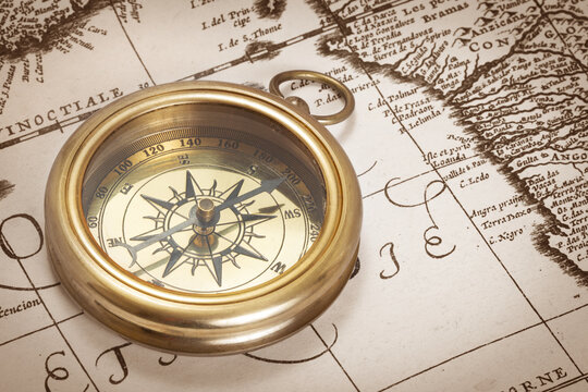 Old compass and map