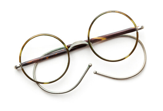 Vintage circular eyeglasses on a white background