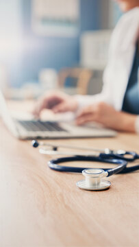 Healthcare professional working on computer