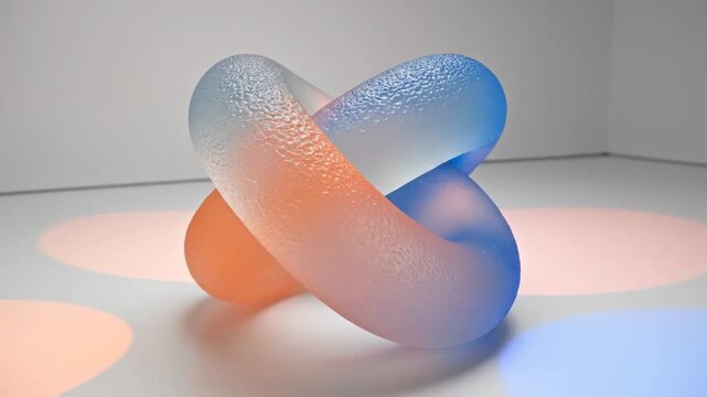 Colorful abstract shapes twist and turn in a bright studio space