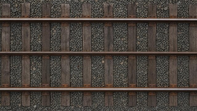 Top-down view of parallel railway tracks and wooden sleepers creating geometric lines.