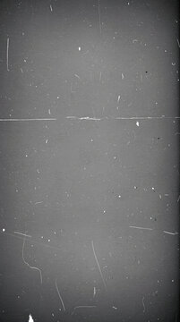 Vintage film grain overlay texture with authentic dust and scratches.