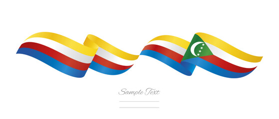Comorian flag ribbon vector illustration. Waving patriotic Comoros Flag Ribbon Banner on isolated white background © simbos