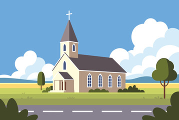 Naklejka premium Protestant or Catholic church building stands peacefully in a green field alongside a road under a blue sky with fluffy white clouds.