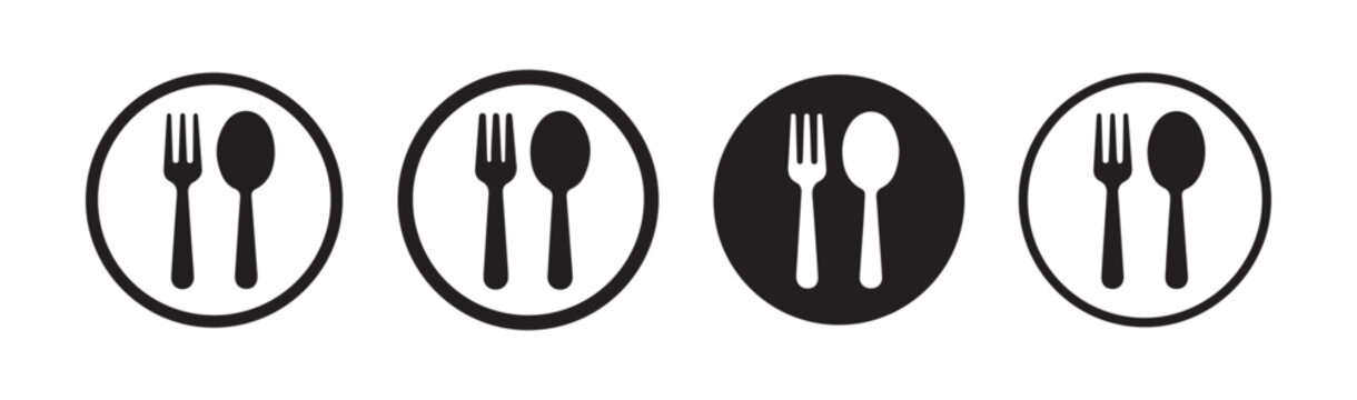 Circular dining signs featuring fork and spoon combinations for restaurant entrance or menu display.