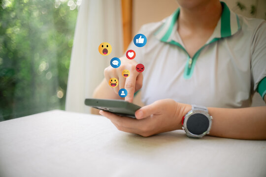 Social Distancing ,Working From Home concept..The concept of living on vacation and playing social media. Social media and digital online concept, man using smart phone with Social media..