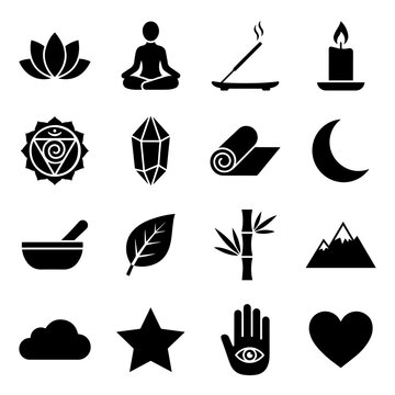 Set of black yoga and meditation featuring lotus flower, incense, candle, chakra symbol, crystal, yoga mat, moon, mortar, and mountain
