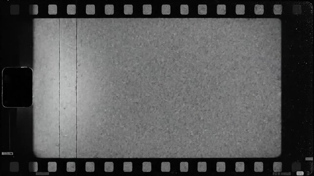 Reel of vintage film strips showcasing classic black and white movie frames with grainy textures and film perforations