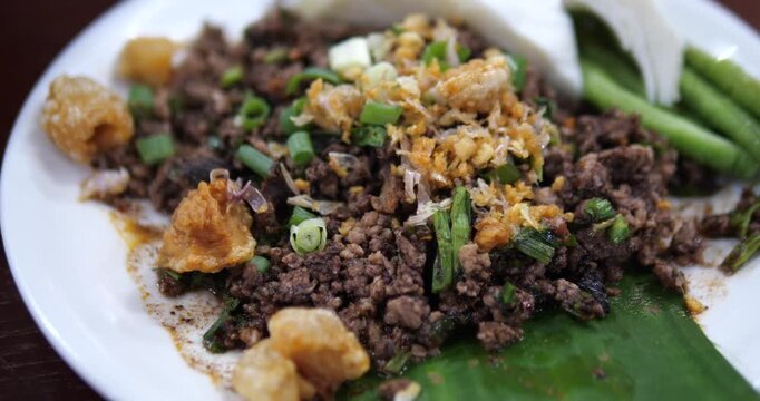 Close up of traditional northern Thai larb mu khua minced pork
