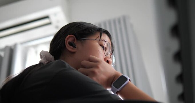Asian young woman working focused in front of computer laptop