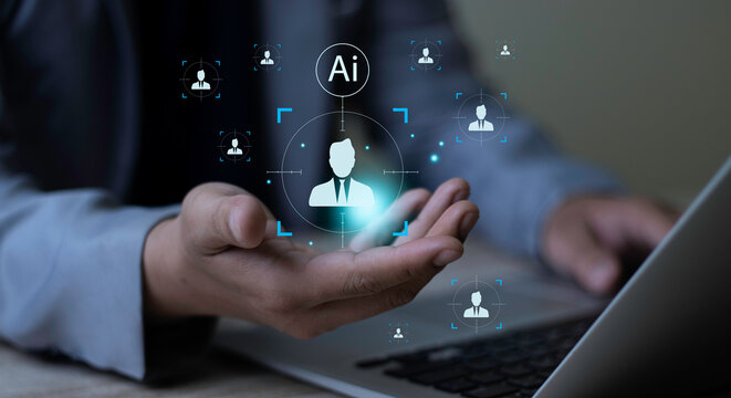 Businessman showing open hand with virtual AI recruitment target focus ring and candidate profiles on laptop. Concept of talent acquisition, executive search, and headhunting technology.