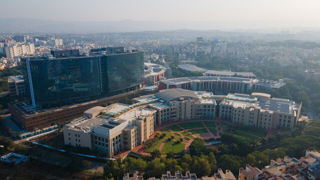Commercial office complex and urban development aerial view
Pune technology hub and corporate headquarters drone shot