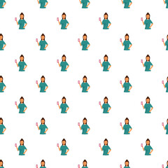 Fototapeta premium Young woman standing and showing a smartphone device in a seamless pattern