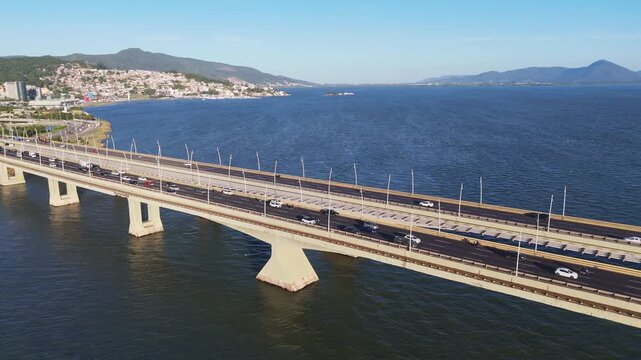 Aerial View of Pedro Ivo Campos and Colombo Salles Bridges with City Traffic and Ocean Coastline in Florianopolis Santa Catarina Brazil