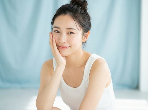 A Beautiful Young Asian Woman With Natural Makeup And Radiant Clear Skin