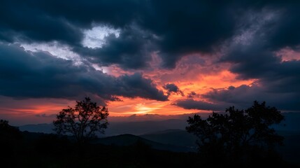 Fototapeta premium A majestic and mystical sunset illuminates the distant horizon with dramatic colorful skies