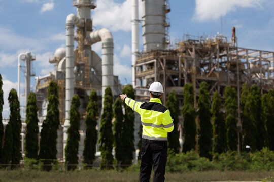 Petroleum engineer working at oil refinery site
