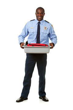 Airline: Guard Holding Scanning Bin with Suitcase