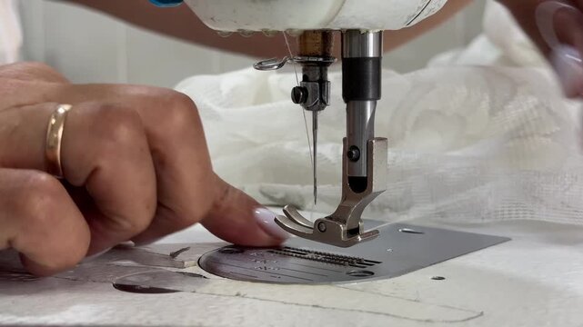 close up of a sewing machine and work process 