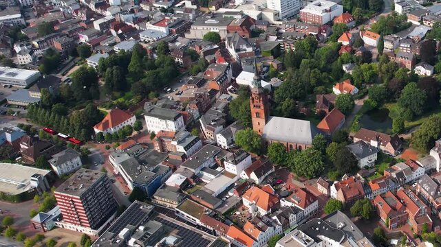 Aerial view around the downtown beside the city of Itzehoe in Germany on a sunny morning day in summer