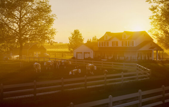 Sunlit farmhouse with barn and fenced countryside at sunset