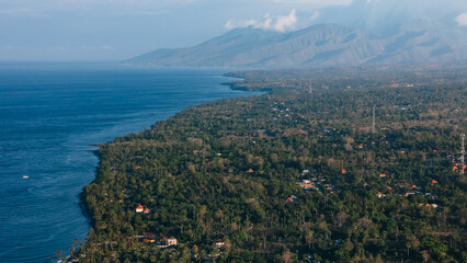 Fototapeta premium Above view of coastline with ocean in North Bali