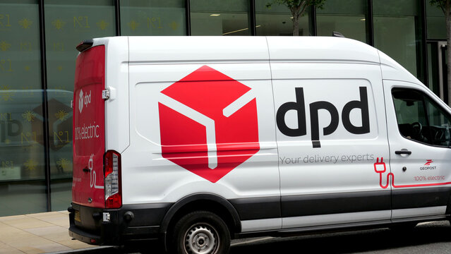 Manchester, England, UK - 18 June 2026: DPD electric delivery van on city street, 100% electric eco courier vehicle close up, geopost parcel logistics branding in UK