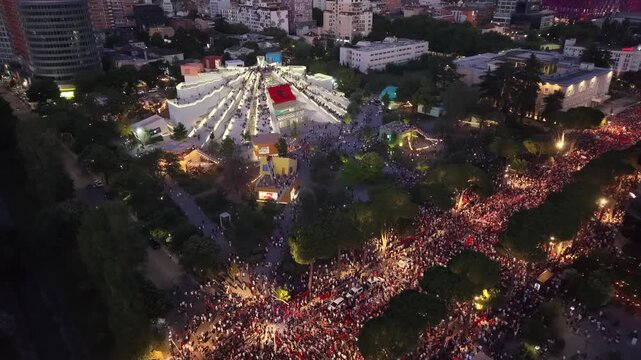 Drone View Over pyramid Building with albanian flag and Tirana Protest, 20 June 2026