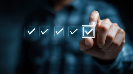 Fototapeta premium Businessman pressing glowing golden checkbox in digital interface row on dark blue background concept