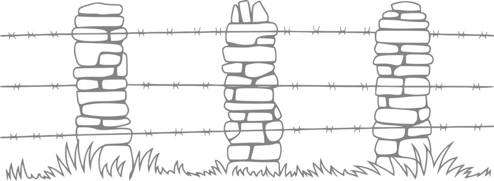 Rustic stone fence posts with barbed wire and grass