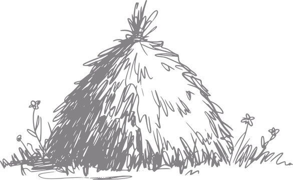 Of a haystack with small flowers in a field