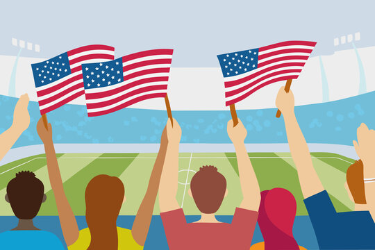 Fans wave American flags during a soccer match at a stadium with excitement and energy in the crowd while supporting their team