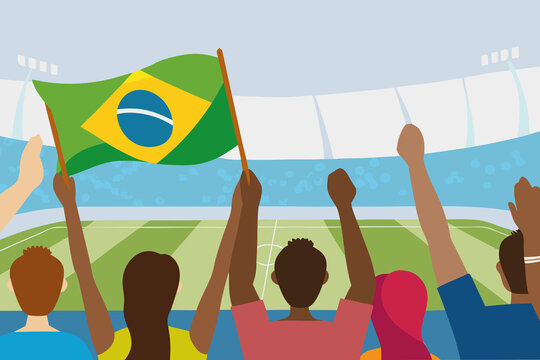 Crowd of fans waving Brazilian flag at soccer match in stadium during day
