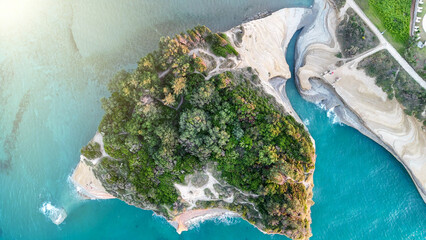 Panoramic aerial shot of Canal d’Amour cliffs at sunset in © jovannig