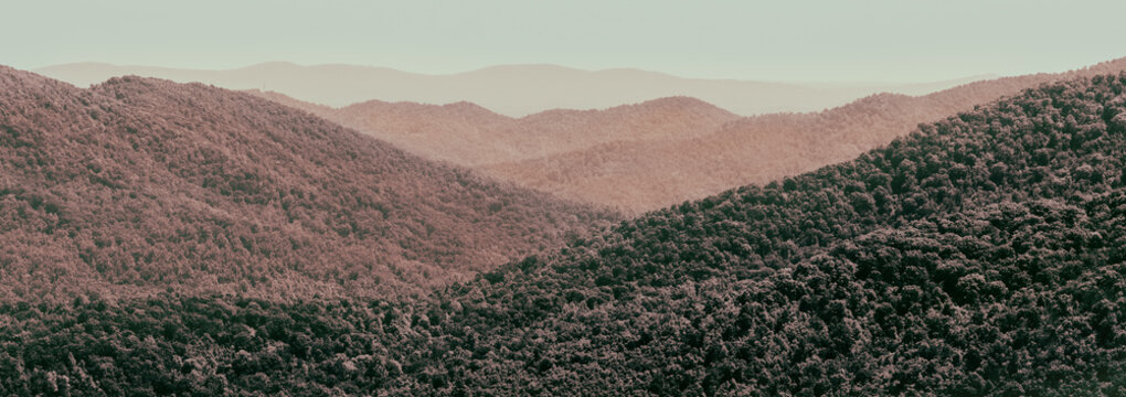Blue ridge mountains layered in vibrant culture, a peaceful and scenic view